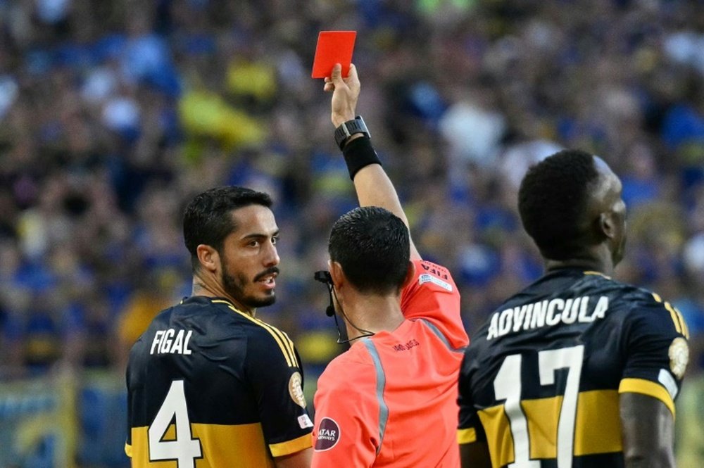 Figal saw red for a reckless challenge on Florentino Luis. AFP