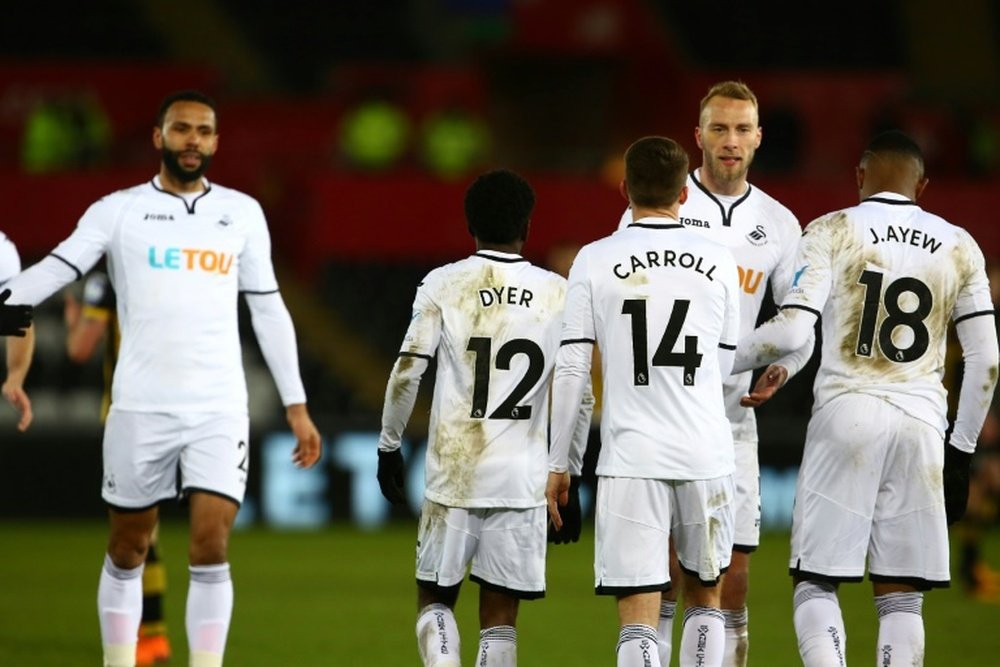 Swansea are just ahead of Southampton on goal difference. AFP