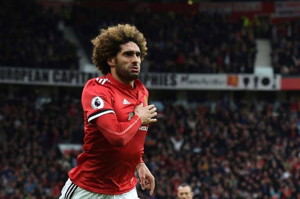 Fellaini will be a free agent this summer. AFP