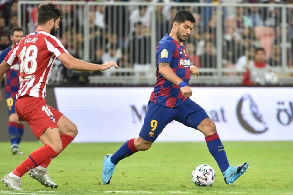Suárez would prefer a move to Atlético. AFP