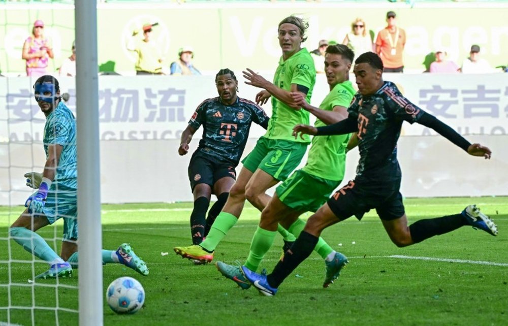 Amoura is contracted to Wolfsburg until June 2028. AFP