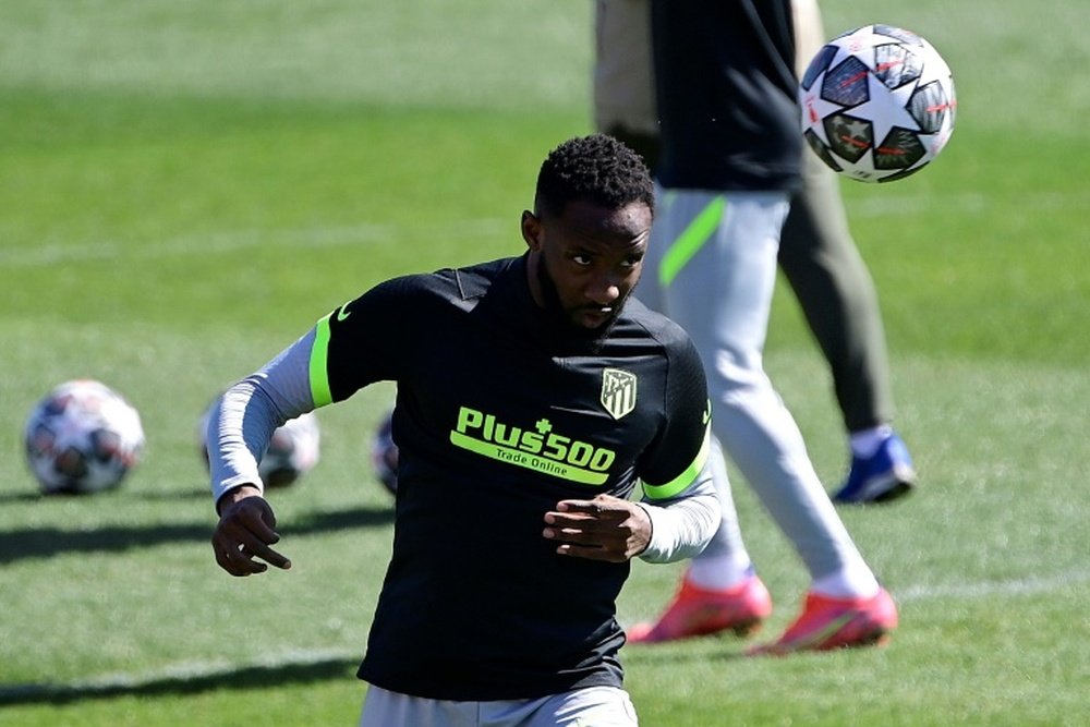 Moussa Dembélé quiere volver cuanto antes para ayudar al Atleti. AFP/Archivo
