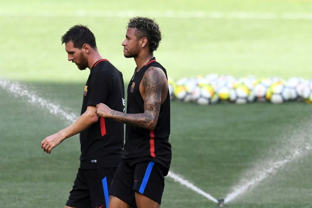 Messi sonha em ter a companhia de Neymar outra vez. AFP
