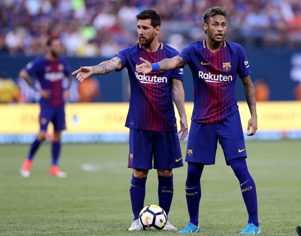Messi wants Neymar to return to Barca and is against Griezmann arriving. AFP