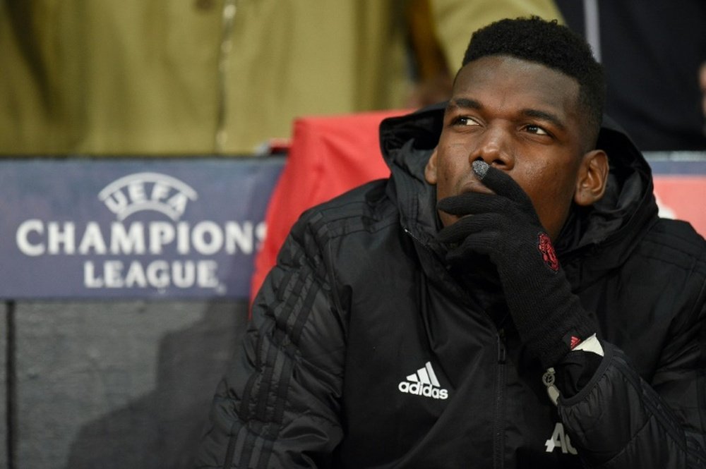 Pogba has been told that he will remain at Manchester United. AFP