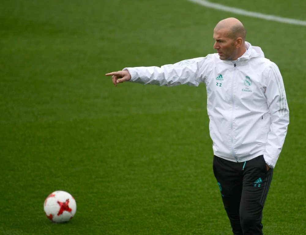 Zinedine Zidane garde les pieds sur terre. AFP