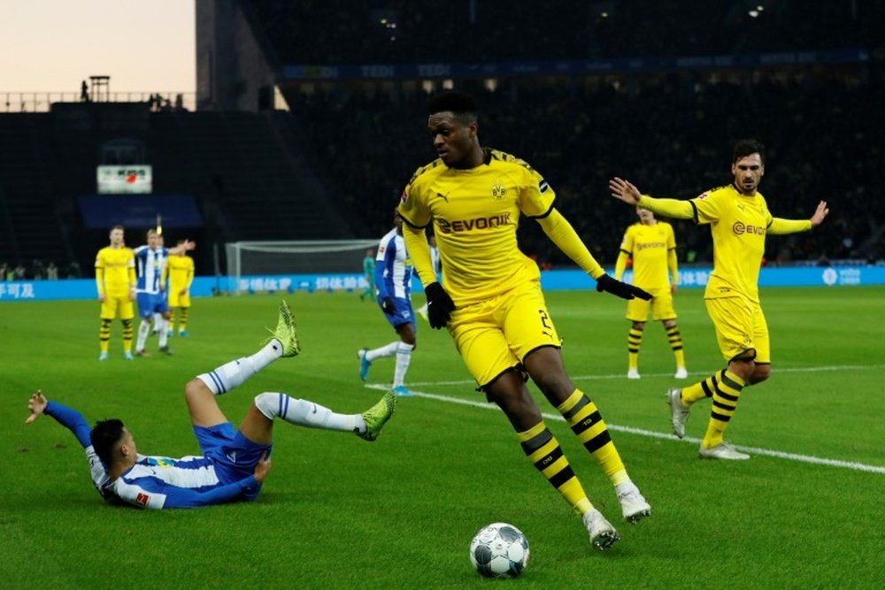 Mesmo com um a menos, o Dortmund vence em Berlim. AFP