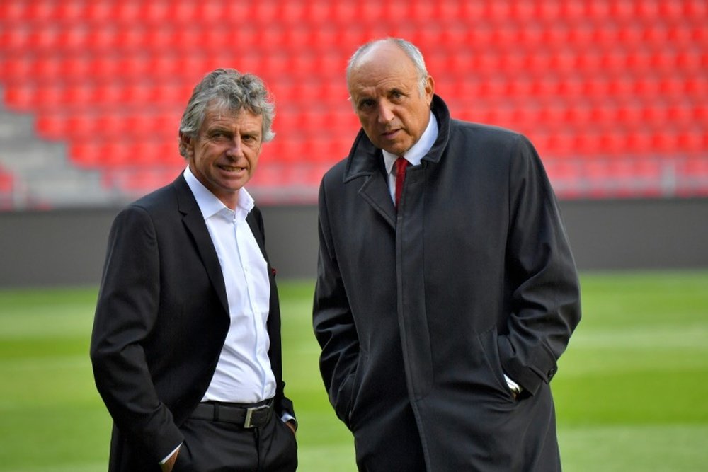 L'entraîneur de Rennes Christian Gourcuff et le président du club René Ruello. AFP