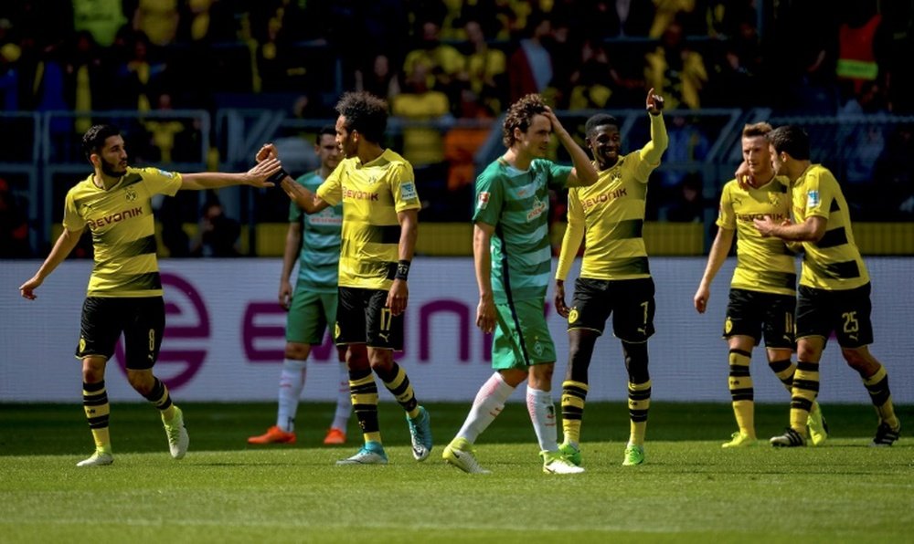 El Borussia venció a un peleón Werder Bremen y terminó la temporada tercero. AFP