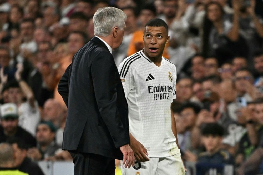 Kylian Mbappe wanted to be present for the Atletico-Real Madrid derby from the stands. AFP