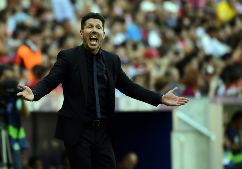 Simeone espera derrotar al Barça por fin en Liga. AFP