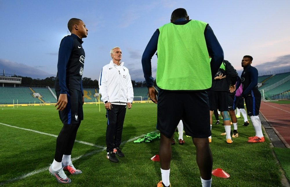 French fancy? Deschamps can see Mourinho managing in Ligue 1. AFP