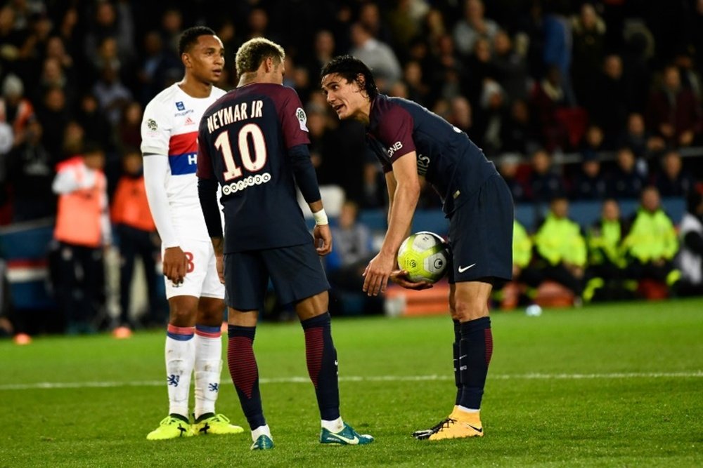 Cavani and Neymar argue over who will take the penalty. AFP