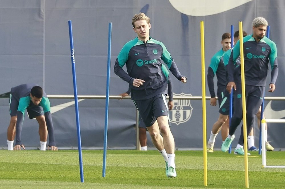 Frenkie de Jong did not travel to Belgium due to a fever. AFP