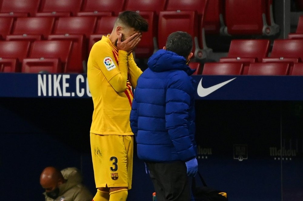 Pique will likely be out for months. AFP
