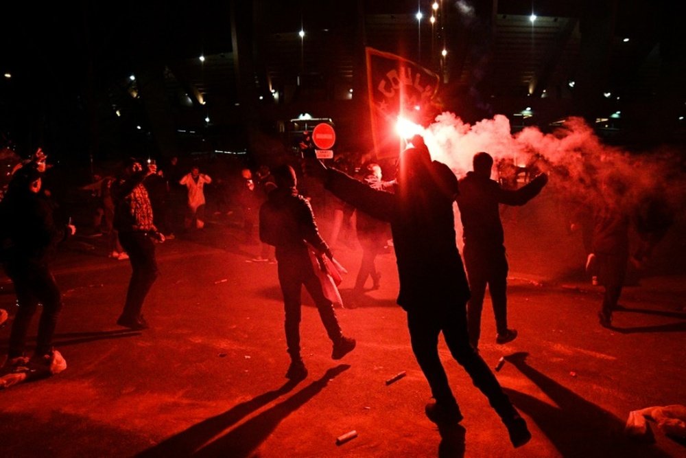 Fans gathered outside the stadium. AFP