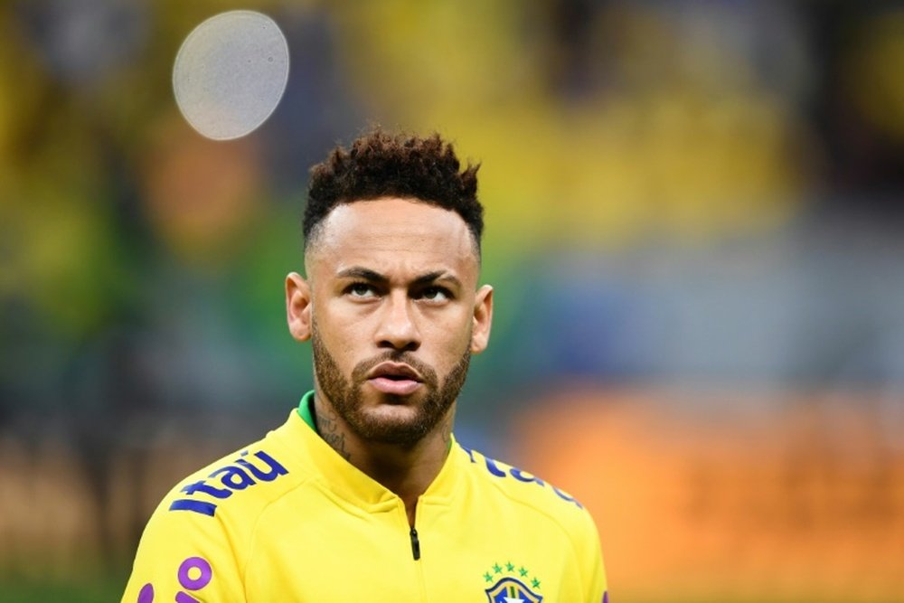 Neymar já teria dito ao grupo seu desejo de voltar. AFP
