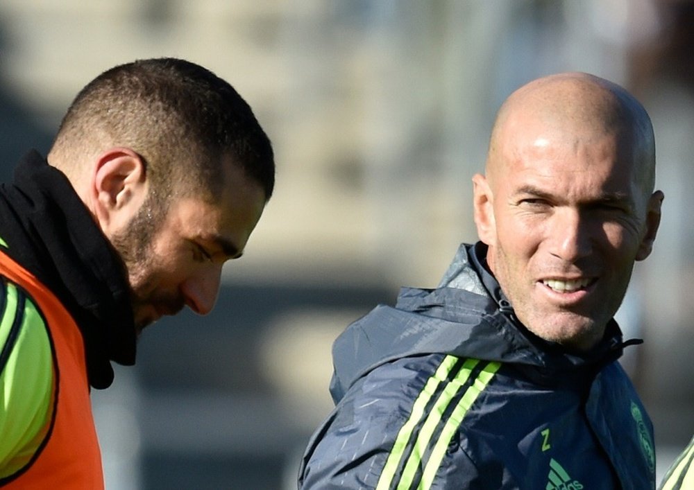 Zinedine Zidane et Karim Benzema lors d'une séance d'entraînement. AFP