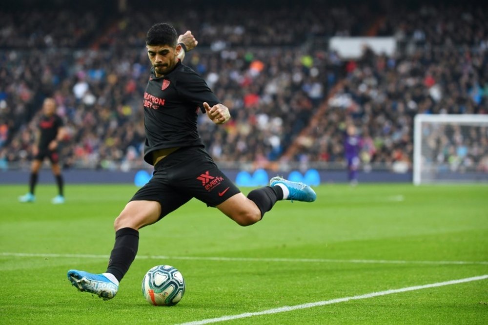Banega has reached an agreement with Sevilla to stay until the end of August. AFP