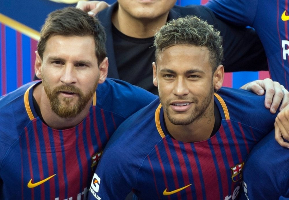 Messi and Neymar. AFP
