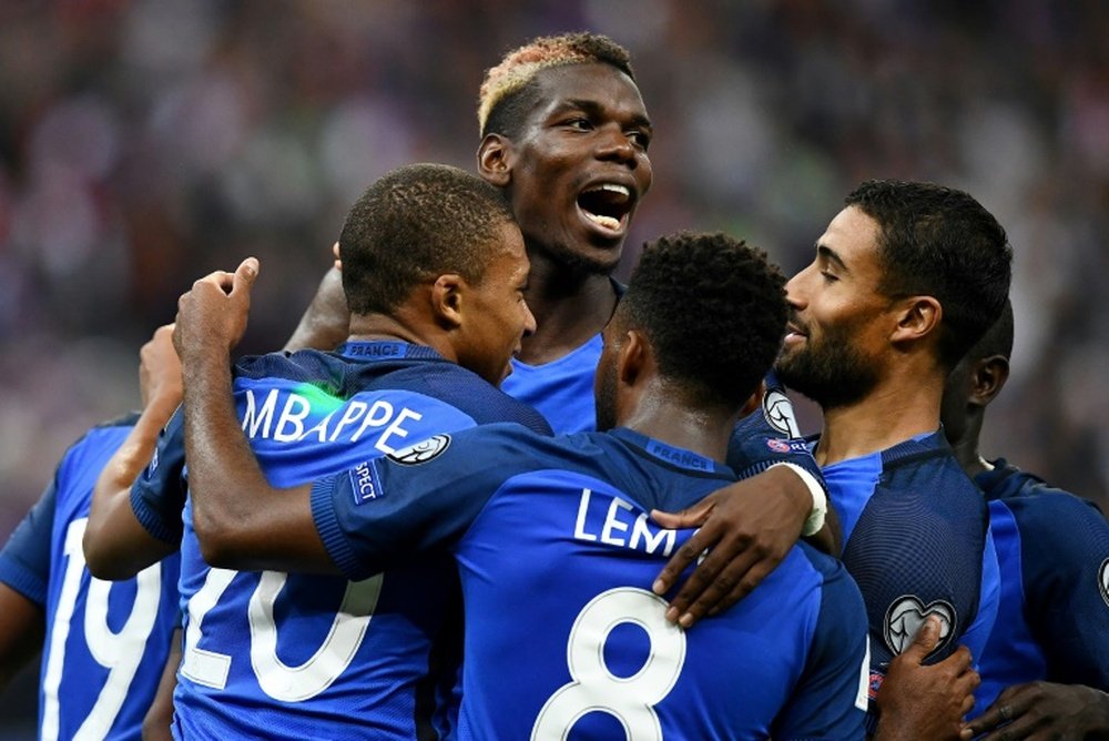 Les joueurs français après un but contre les Pays-Bas lors des qualifications au Mondial-2018. AFP