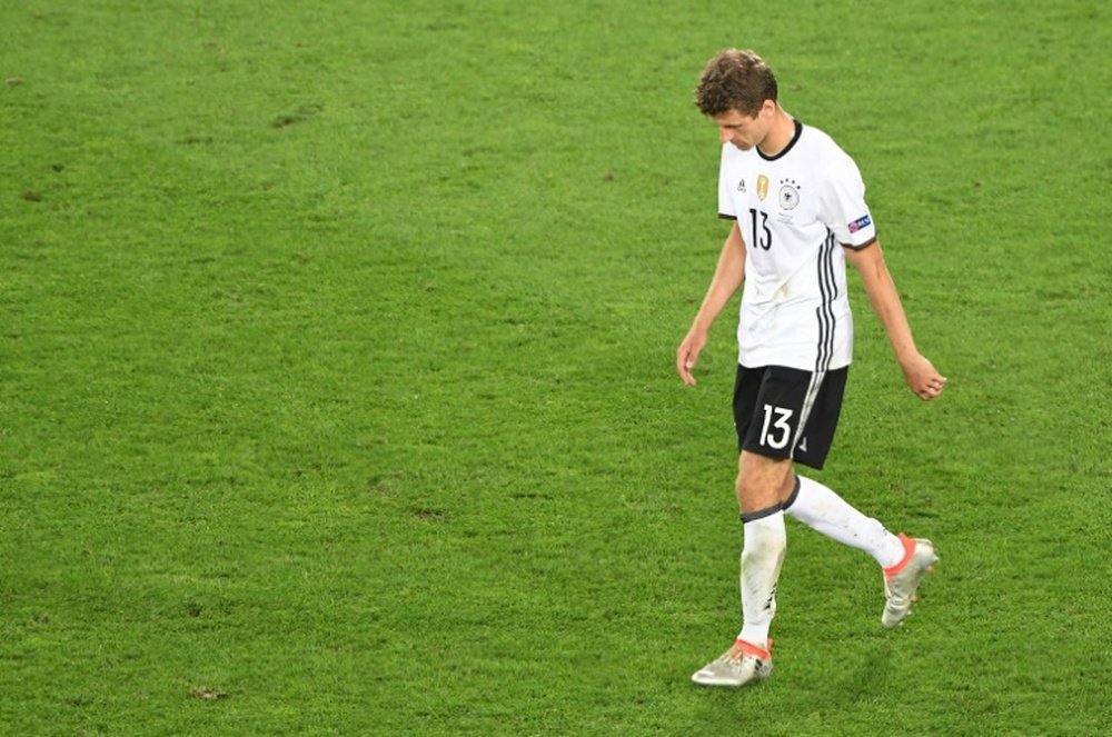 Muller walks back to his team, having seen his penalty saved by Buffon. BeSoccer