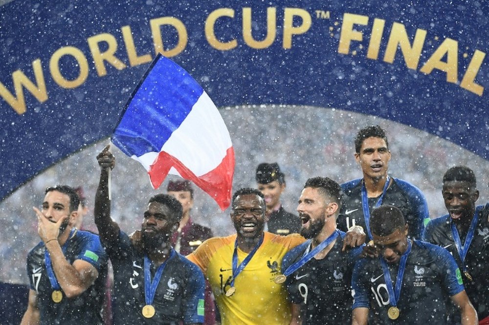 Les joueurs de l'équipe de France fêtent leur victoire en finale du Mondial. AFP