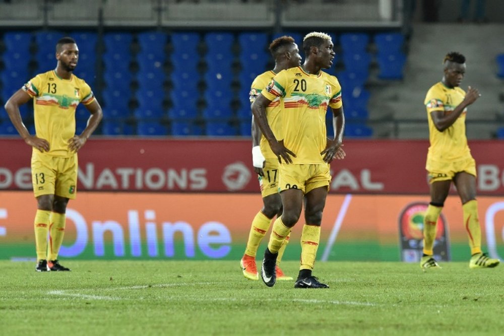 Les joueurs maliens n'ont pu faire mieux qu'un match nul contre l'Ouganda dans le groupe D. AFP