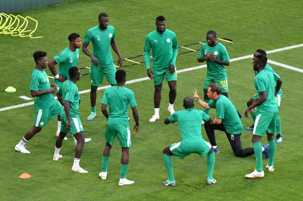 Les Sénégalais à l'échauffement avant le match contre contre la Colombie au Mondial. AFP