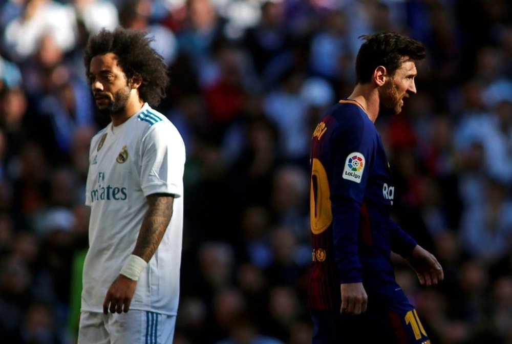 The pair will face off at Camp Nou on Sunday. AFP