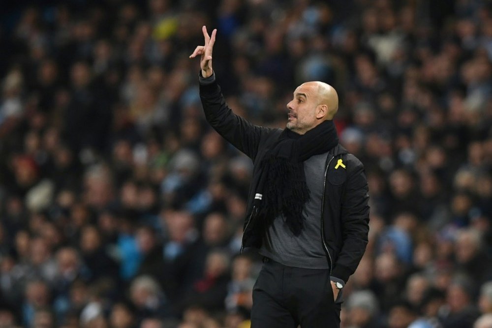 Man City 'planning talks' to extend Guardiola's contract. AFP