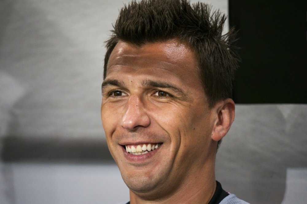 Mario Mandzukic podría acabar en el Milan. AFP/Archivo