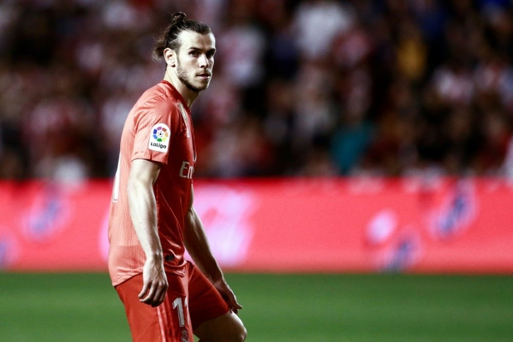 Bale's summer is bound to be complicated. AFP