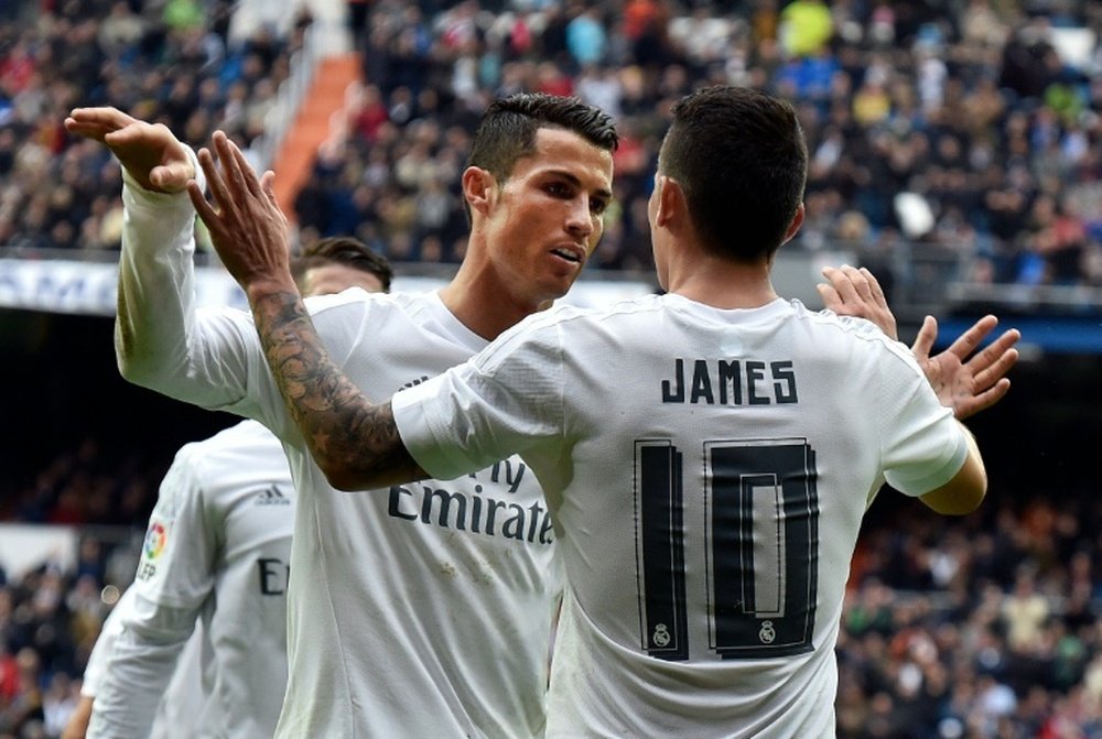 Cristiano conversou com James e pediu para ficar no Real Madrid. AFP