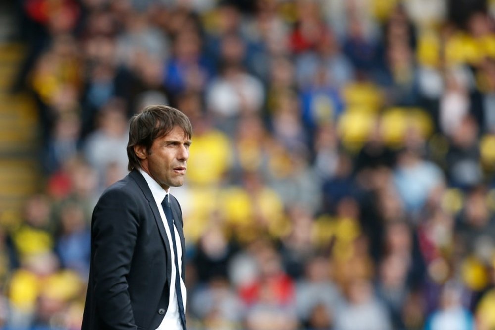 Conte stands on the touchline in Chelsea's victory over Watford. AFP