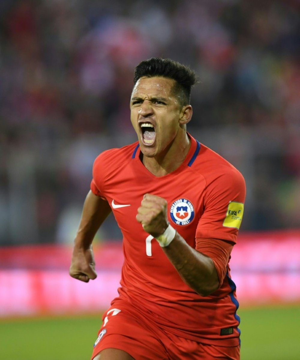 Wenger urges Sanchez to forget World Cup heartache. afp