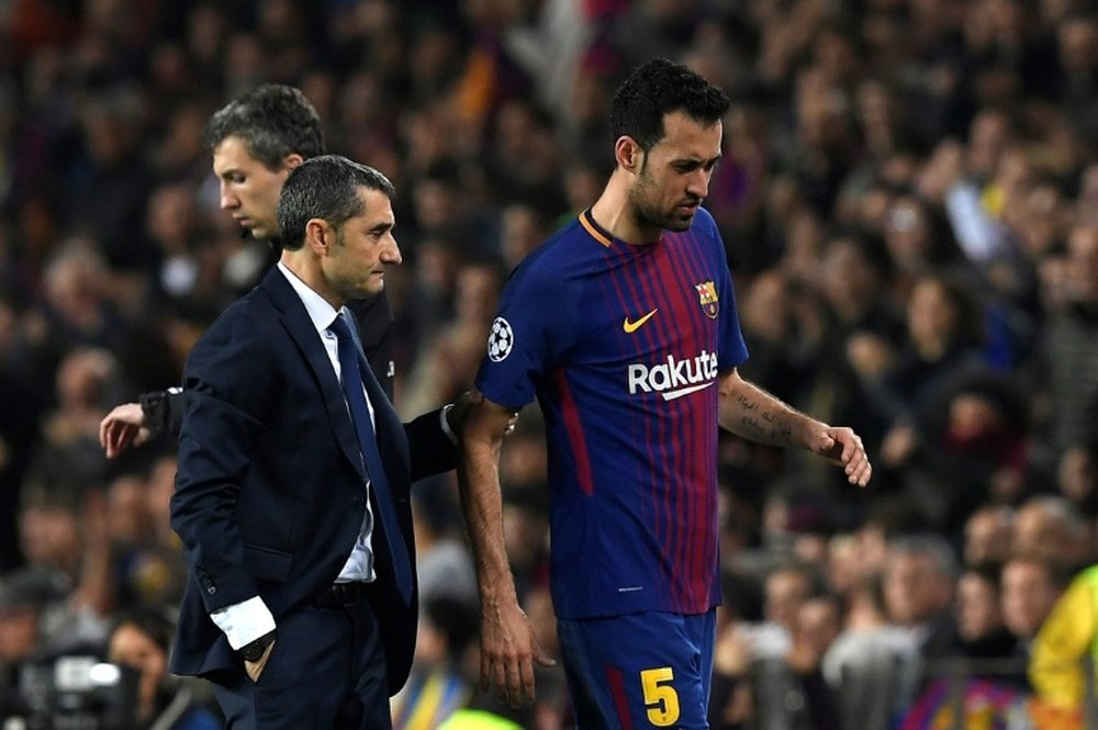 Busquets wants an increase on his current salary. AFP