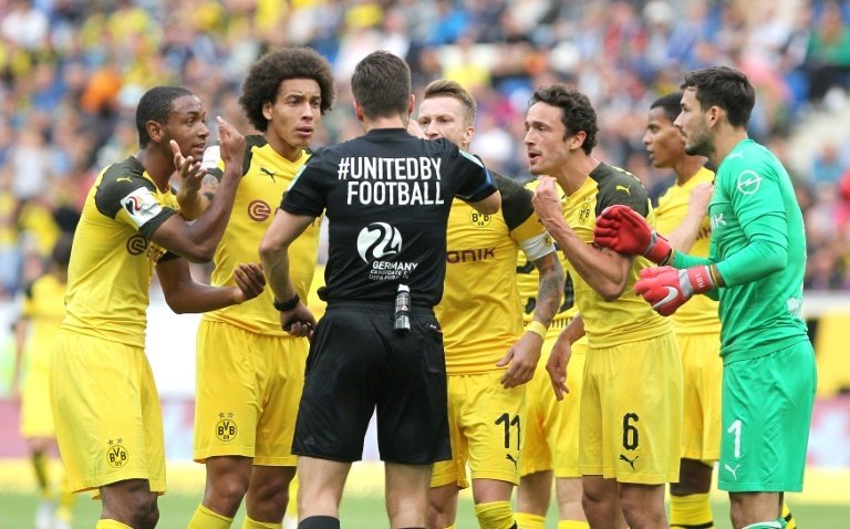Reus and co were not happy with the referee. AFP