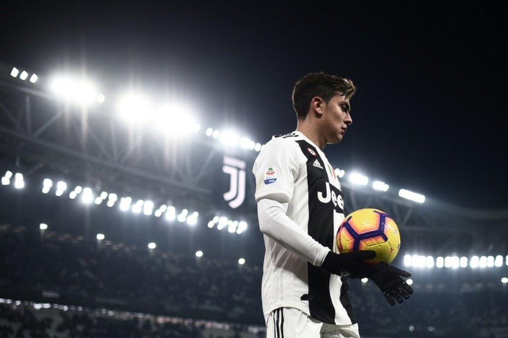 Dybala has had a tough time at Juventus this season, despite the club's success. AFP