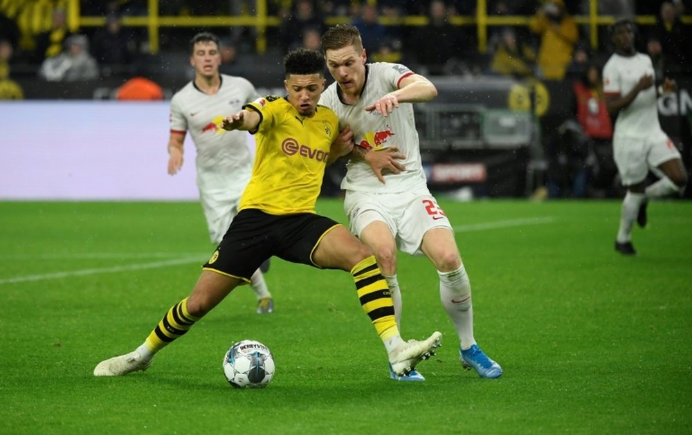 Emre Can déconseille Manchester United à Jadon Sancho. AFP