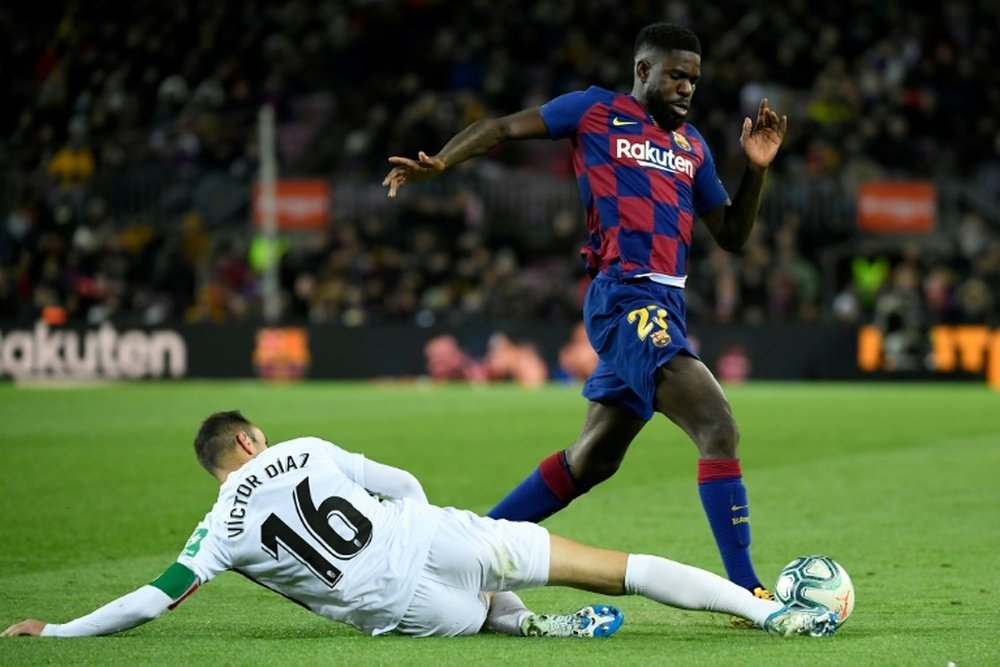 Umtiti reaccionó tras confirmar el Barça su lesión. AFP