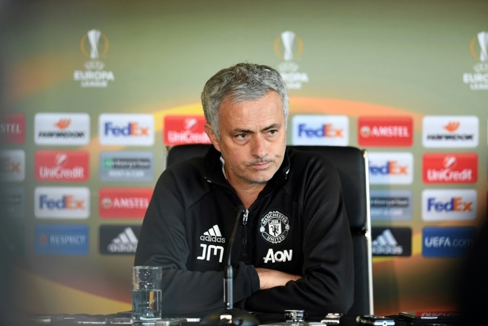 Jose Mourinho insisting on holding a minute of silence. AFP