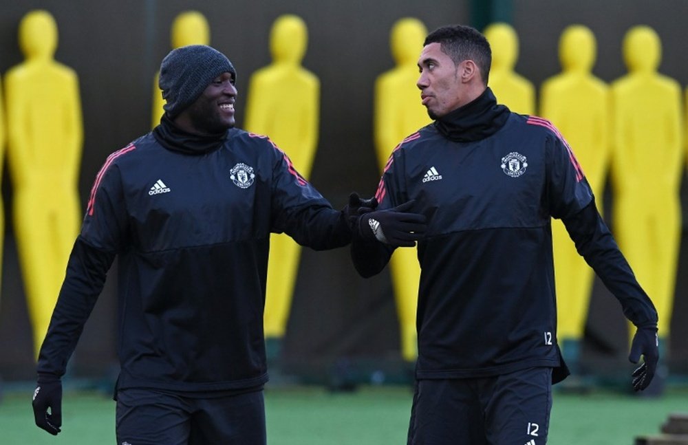 L'attaquant de Manchester United Romelu Lukaku et le défenseur Chris Smalling. AFP