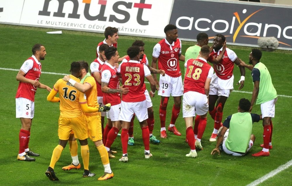 Reims will be playing in Ligue 1 next season. AFP