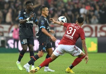 Alexis Sanchez (C) played the second half of Marseille's draw at Brest. AFP