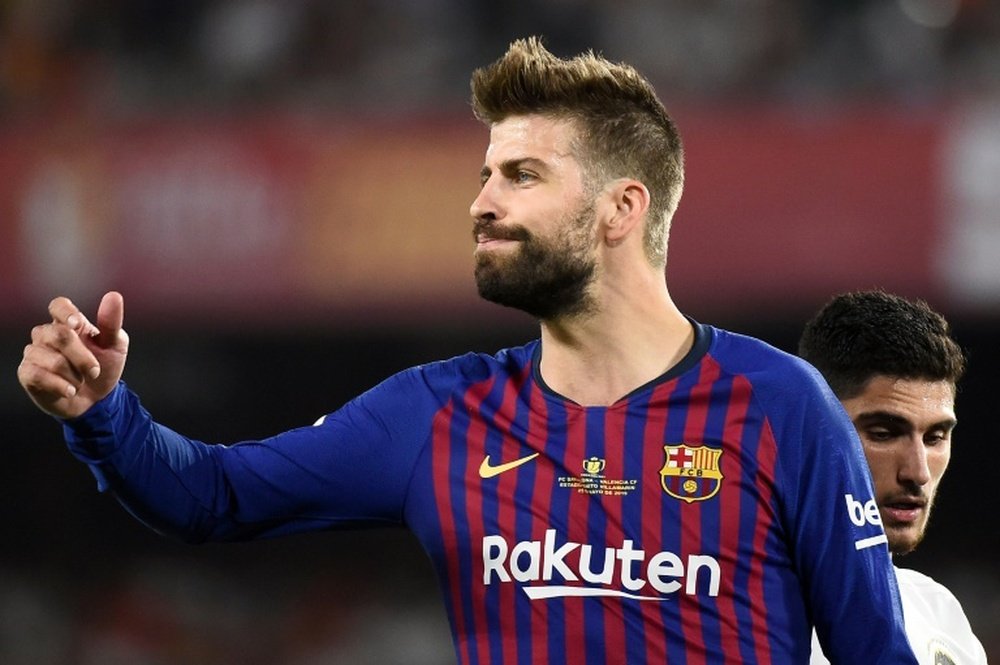 Pique will play his 500th for the club game on Sunday. AFP
