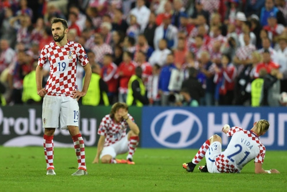 Los aficionados croatas pasaron de la euforia al drama, al contrario que los lusos. AFP
