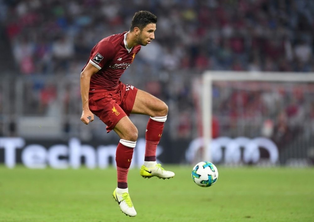 Marko Grujic no quiere volver aún al Liverpool. AFP/Archivo