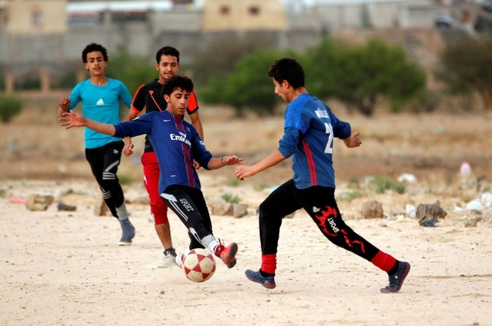 Le football en milieu des conflits. AFP