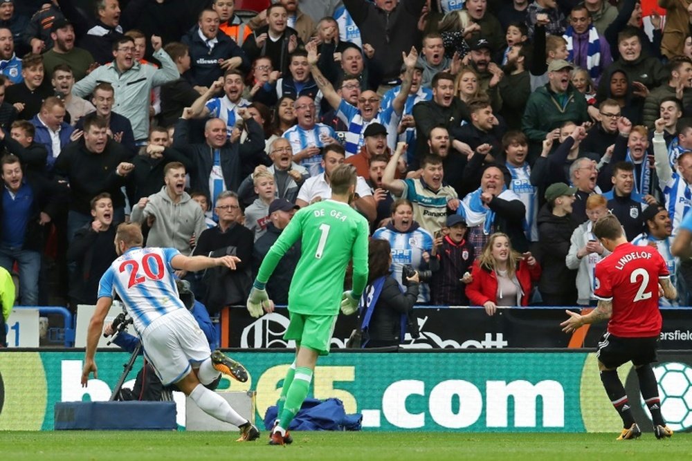 Depoitre celebrates scoring Huddersfield's second. AFP